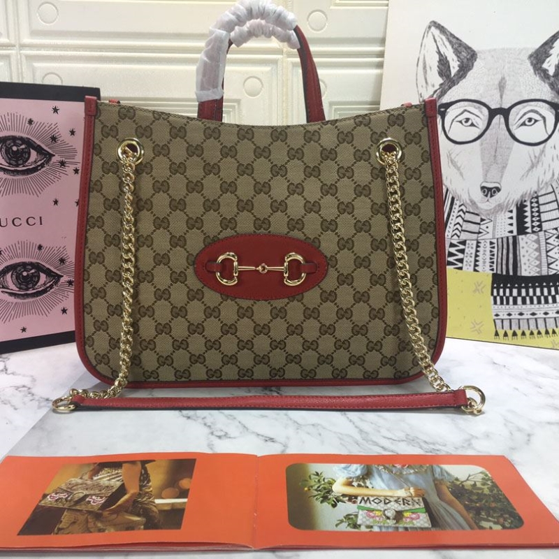 G*u*i shopping bags
